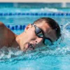 gemini-image-2_Ultra-realistic_professional_sports_photography_of_a_competitive_swimmer_perform-0_1080x.jpg